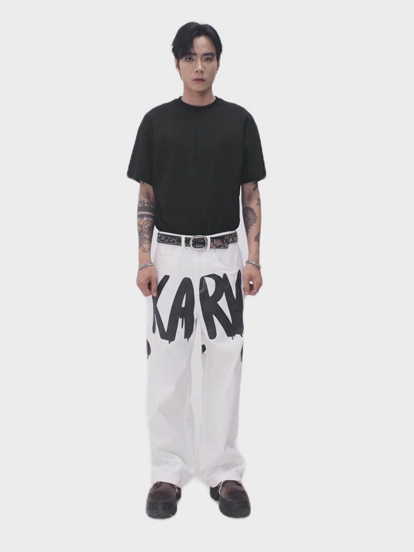 The Contrast Manifesto Kaki Pants | Bold Graffiti Wide-Leg Streetstyle Statement